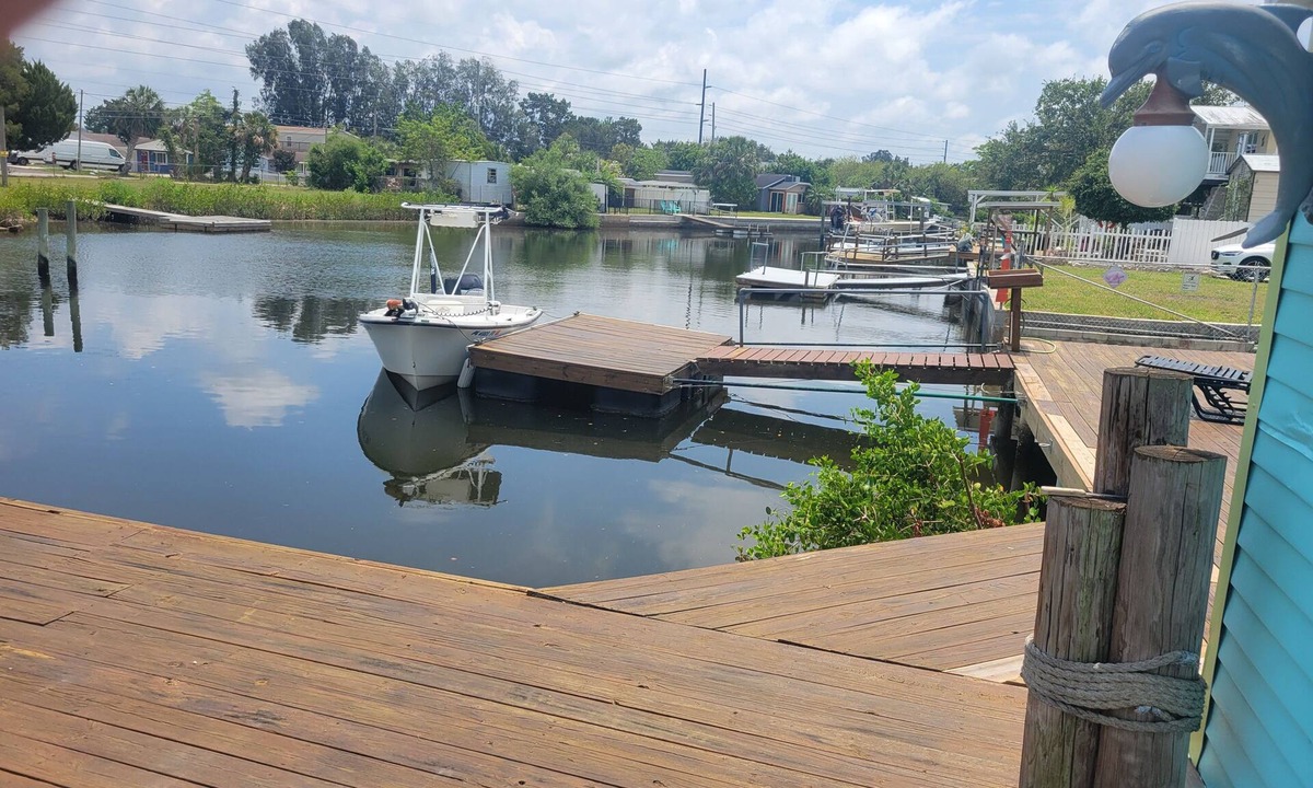 Cape Cay House | 2-bed house with central AC in charming Hudson canal to gulf in minutes.