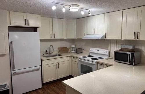 Punaluu Condo | Beach Front Condo w/Beautiful Sunrises on Private Sandy Beach with Calm & Gentle Waves