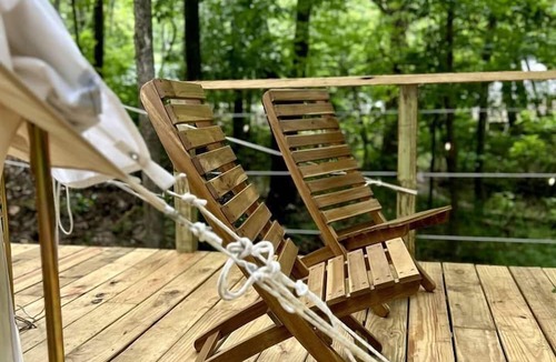 Gentry RV Rental | Charming Woodland Glamping Tents with Fire Pit and Elevated Decks near Gentry, West Virginia