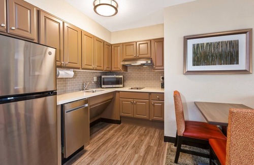 Kalamazoo Condo | Free Breakfast, Pool, Gym. Near Western Michigan University!