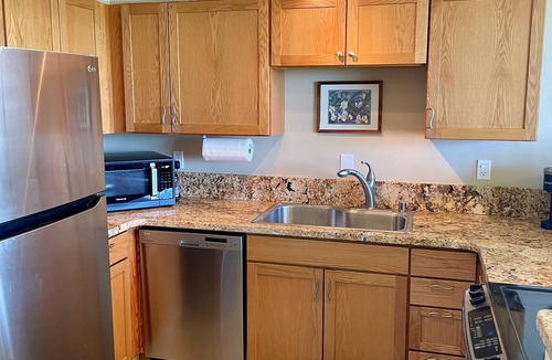 Poipu Condo | Fully Renovated Oceanfront with Air Cond. Ground Floor Unit with Spacious Lanai!
