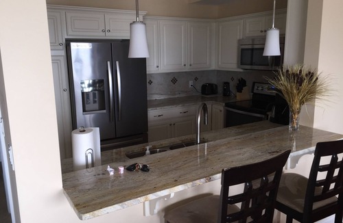 Geneva-on-the-Lake Condo | Ground Floor Lakefront Condo- Indoor Pool, Private Beach, Balcony