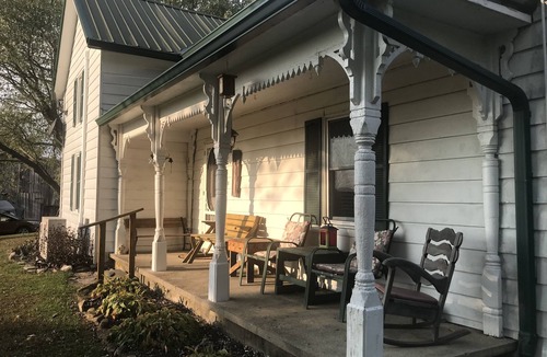 Carlisle House | Hilltop Farmhouse with 3 sunrise- sunrise porches overlooking hills and holler