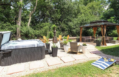 Spry House | Historic York Schoolhouse Retreat | Hot Tub Game Room Fire Pit Sleeps 9