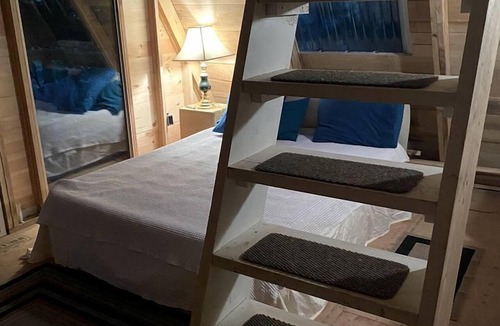 Hopewell Cabin | Incredible A-Frame Tree House Overlooking the Raystown Branch Juniata River and Surrounded by Trees for a Peaceful Getaway in Hopewell, Pennsylvania