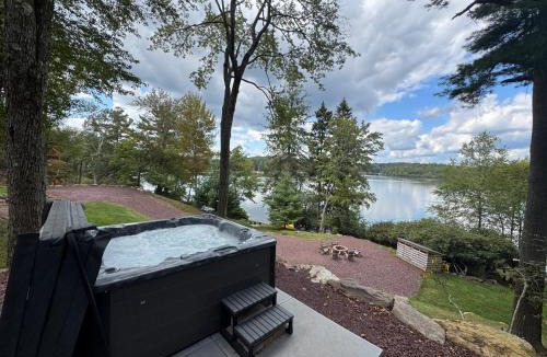 Lake Harmony House | Lakefront Cabin with Hot Tub, Views & Fireplace