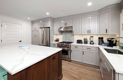 East Beach House | Magnificent Family East Beach Escape! Private Heated Pool, Putting Green, Short Walk To Beach