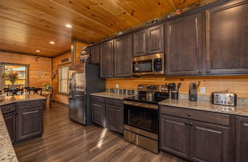 Chalet Village North House | Modern Cabin Movie Theater Hot Tub Game Room
