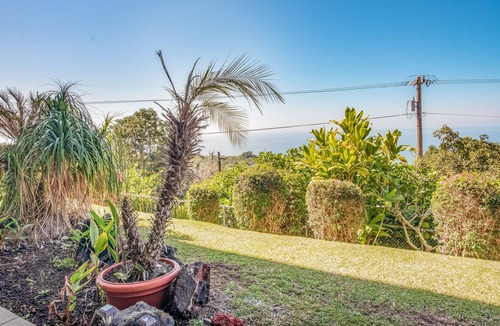 Honalo Condo | Ocean-view condo in great location with outdoor pool, sports courts, & lanai