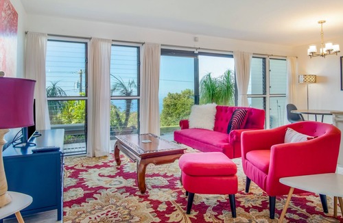 Honalo Condo | Ocean-view condo in great location with outdoor pool, sports courts, & lanai