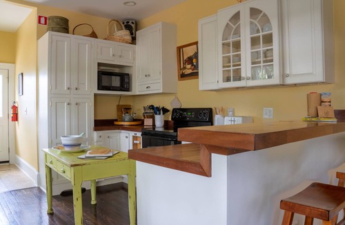 Uptown Cottage | Original Craftsman Cottage, at Magnolia Court Suites