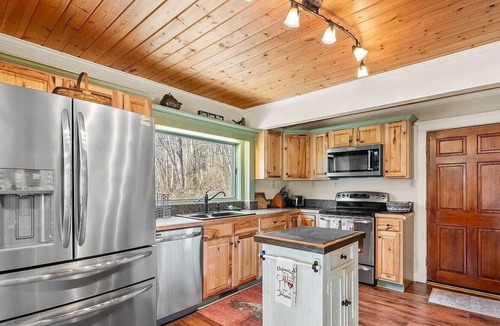 Mills River House | Serenity is a 2 acre retreat. Come get lost in the forest & the babbling creeks!