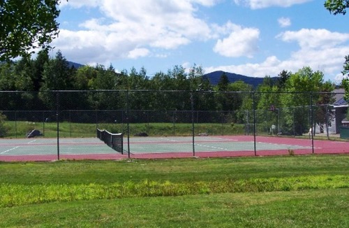 Carrabassett Valley Condo | Ski In/Out Snowbrook Condo w/pool & hot tub. Sleeps 8. Adjacent to ski lift!