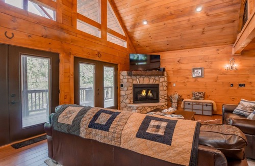 Chalet Village North Ski Chalet | The Buckhorn Cabin is a deer-themed 2 bedroom, 2.5 bath luxury cabin retreat