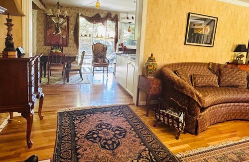 North End House | The Doll House an eclectic style of art and old fashioned doll and antique collections in a doll house designed home in Boise's desirable North End across from a nice park with tennis and basement and walking trails near shopping, hiking, biking, skiing