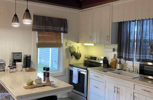 Port Canaveral House | The Iconic Mulvaine Beach House by the Pier with top viewing for space launches