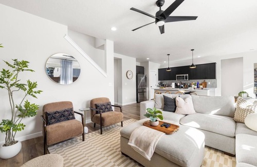 Southwest Ada County Alliance House | This 5-bedroom home has it all—gas fire pit for 8, hot tub, cornhole, ladder golf, ping pong, and a gas grill. Inside, enjoy a rock climbing wall, office desk, and a garage gym.