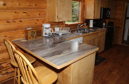 Anchor Point House | Unique Alaskan log home in trees & wild flowers on 14-acre private homestead.