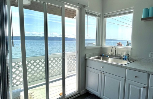 Camano Island Cottage | Waterfront Cabin on Camano Island with hot tub and outdoor patio.