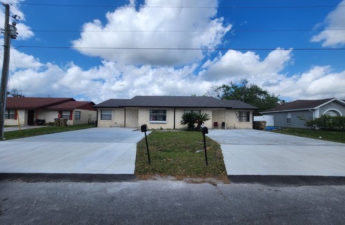 Poinciana Bed & Breakfast | XanCar Villa Cozy 1-bedroom bed & breakfast in tranquil Poinciana with AC