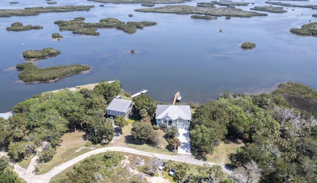 2 Waterfront Homes w Pvt Docks, Kayaks, Outdoor Spaces, Gulf Views in Ozello