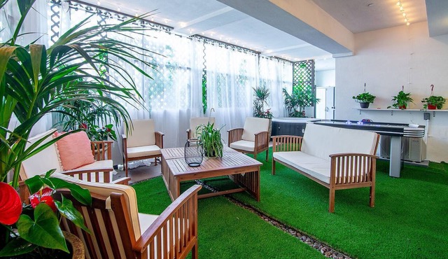 Artfully arranged, open and inviting 2 bedroom suite with a private yard. in Los Angeles