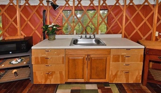 "Glamping" at its finest with wrap around lanai and jetted tub