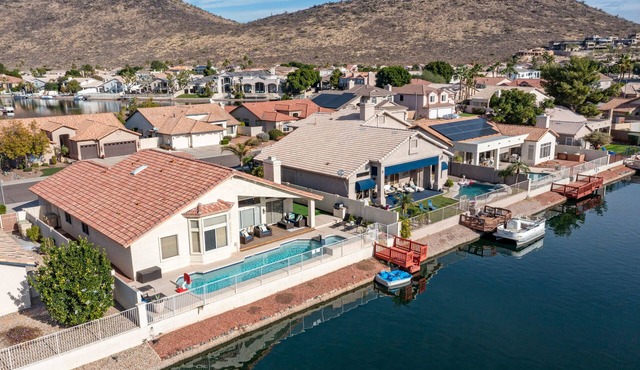 Lakefront Home complete with Mountain Views, Pool, Putting Green & Paddle Boat! in Glendale