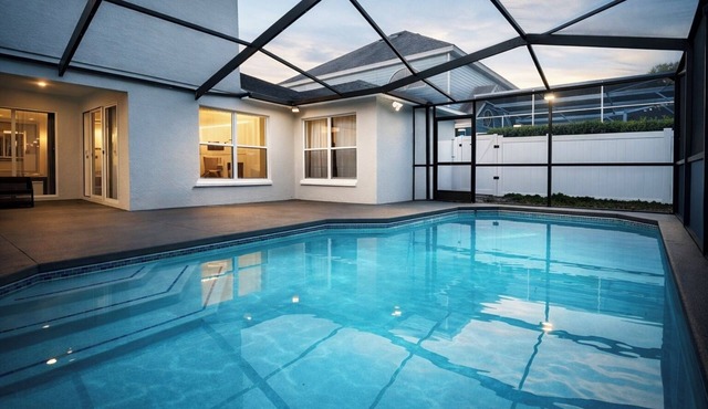 Modern 3-bedroom Chic Home in Davenport minutes from Disney, Pool and Game Room.