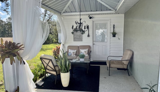 Modern studio apartment with covered outside seating area in Spring Hill