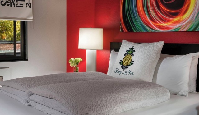 Pineapple Treats & Designer Toiletries in a Vibrant Room near Pike Place Market