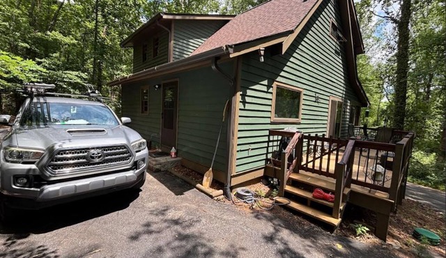 Serenity is a 2 acre retreat. Come get lost in the forest & the babbling creeks!