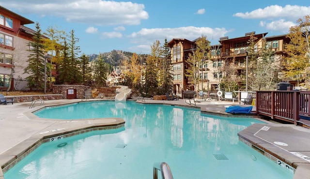 Ski-in - ski-out Powderhorn Condo with Shared Hot Tubs, a Pool & Gym at Club Solitude in Solitude