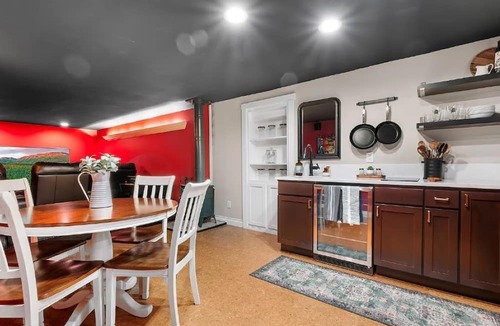 Snohomish House | Historic Speak Easy Wine Cellar and Movie Theatre Guest Room
