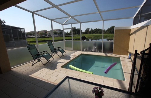 Four Corners House | Outstanding, owner operated Townhome, even a TV in the pool area!