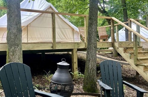 Gentry RV Rental | Enchanting Mountain Glamping Tents with Elevated Decks and Fire Pit Near Gentry, AR