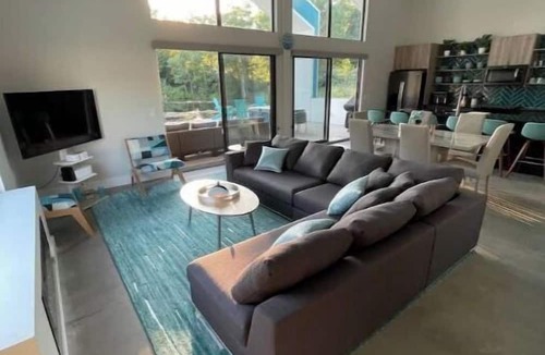 Stevensville House | Lakefront Home - Private Beach - Hot Tub