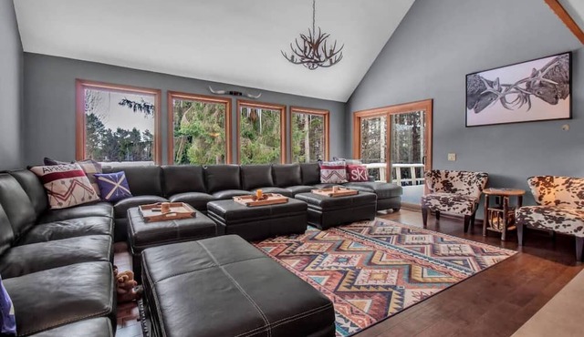 Best of both worlds; chalet located on a private lot in the pines and only 1 miles from the village!