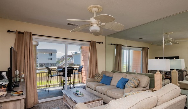 A Pelican's Paradise: Condo with Community Pool and Ocean Views in Caswell Beach